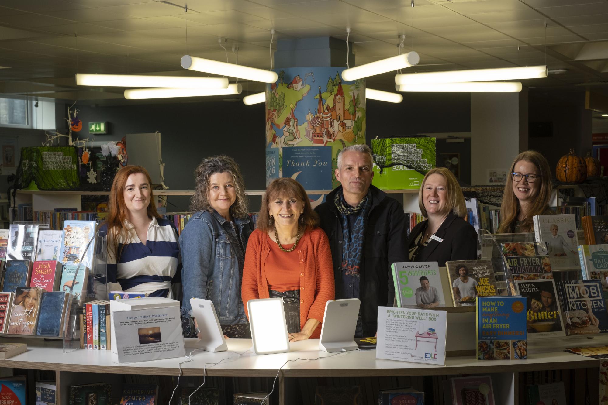 Representatives from the Universities of Glasgow and Edinburgh, Scottish Libraries and Information Council and East Dunbartonshire Leisure & Culture Trust with Claire Charlwood (third left).